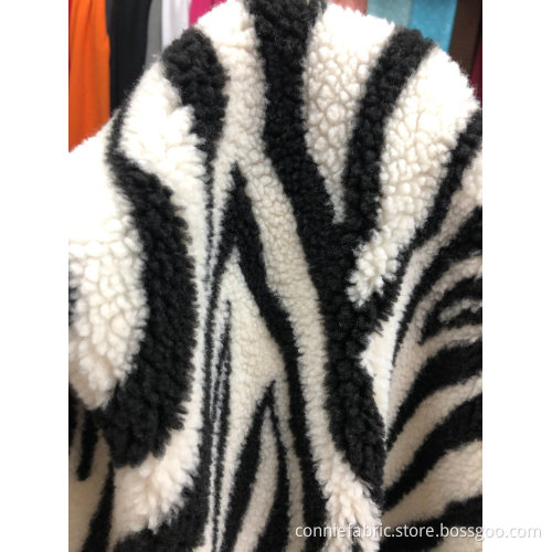 100% Polyester Sherpa Jacquard Stickad med Zebra Stripe